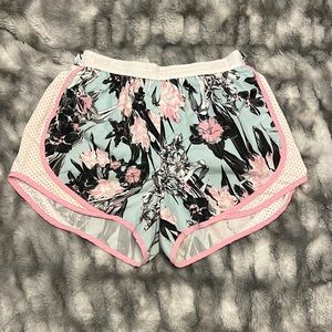 Nike Dri-fit shorts with floral designs